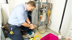 technician-working-on-a-furnace