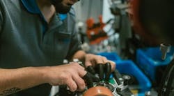 Assembly work at the ebm-pabst facility in Lauf an der Pegnitz, Germany.